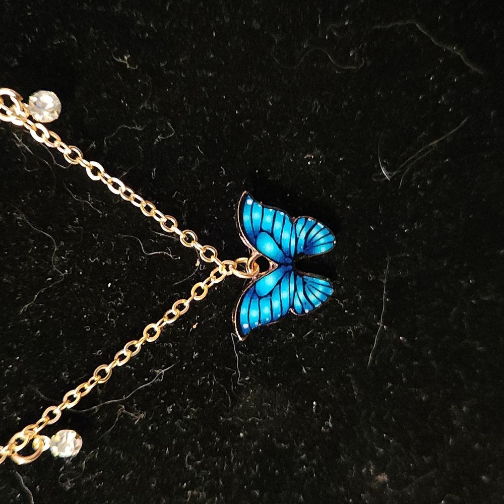 5/$12 Jewelry Butterfly necklace with gold chain with little white gems